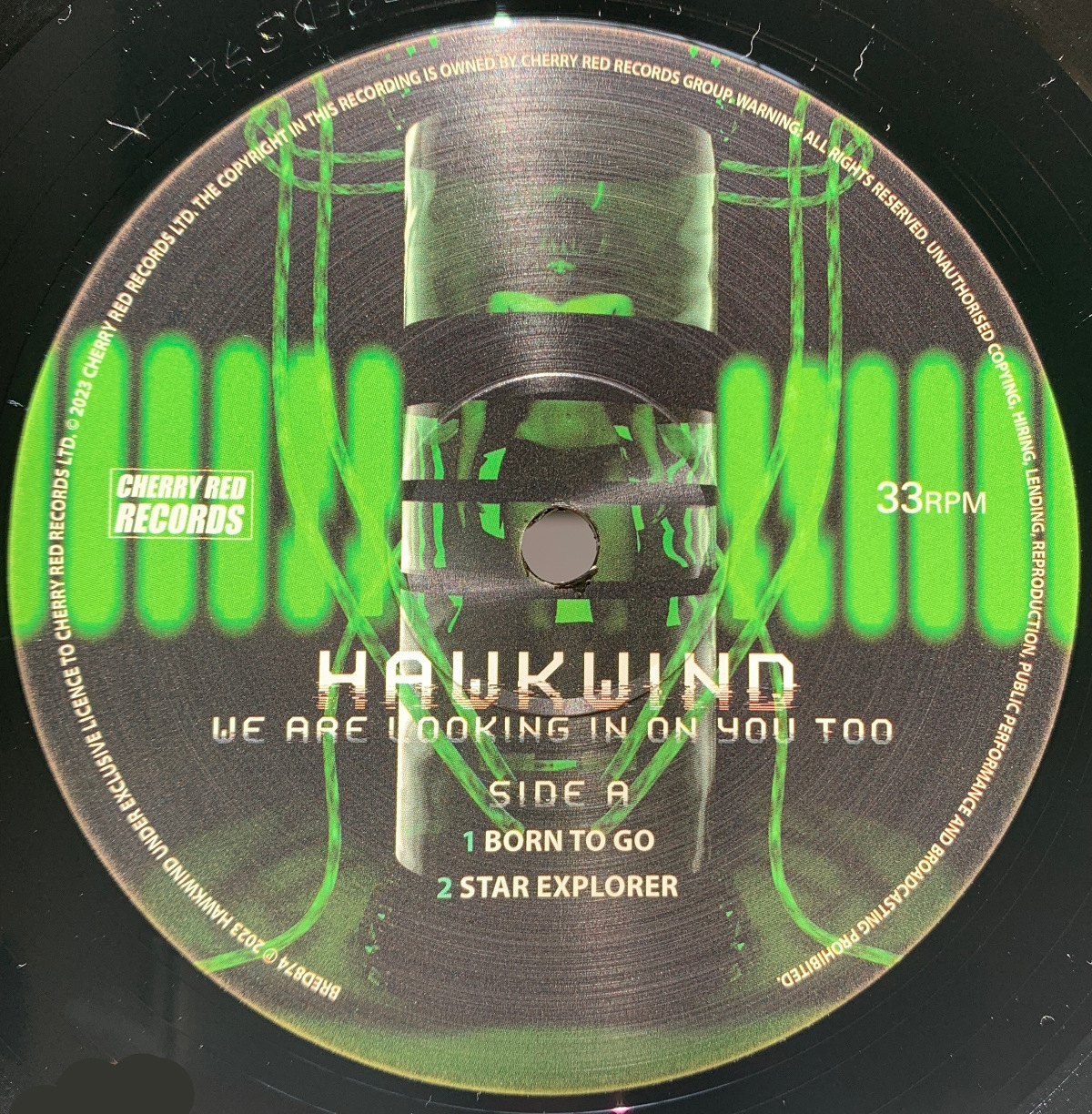 Hawkwind / WE ARE LOOKING IN ON YOU TOO vinyl label